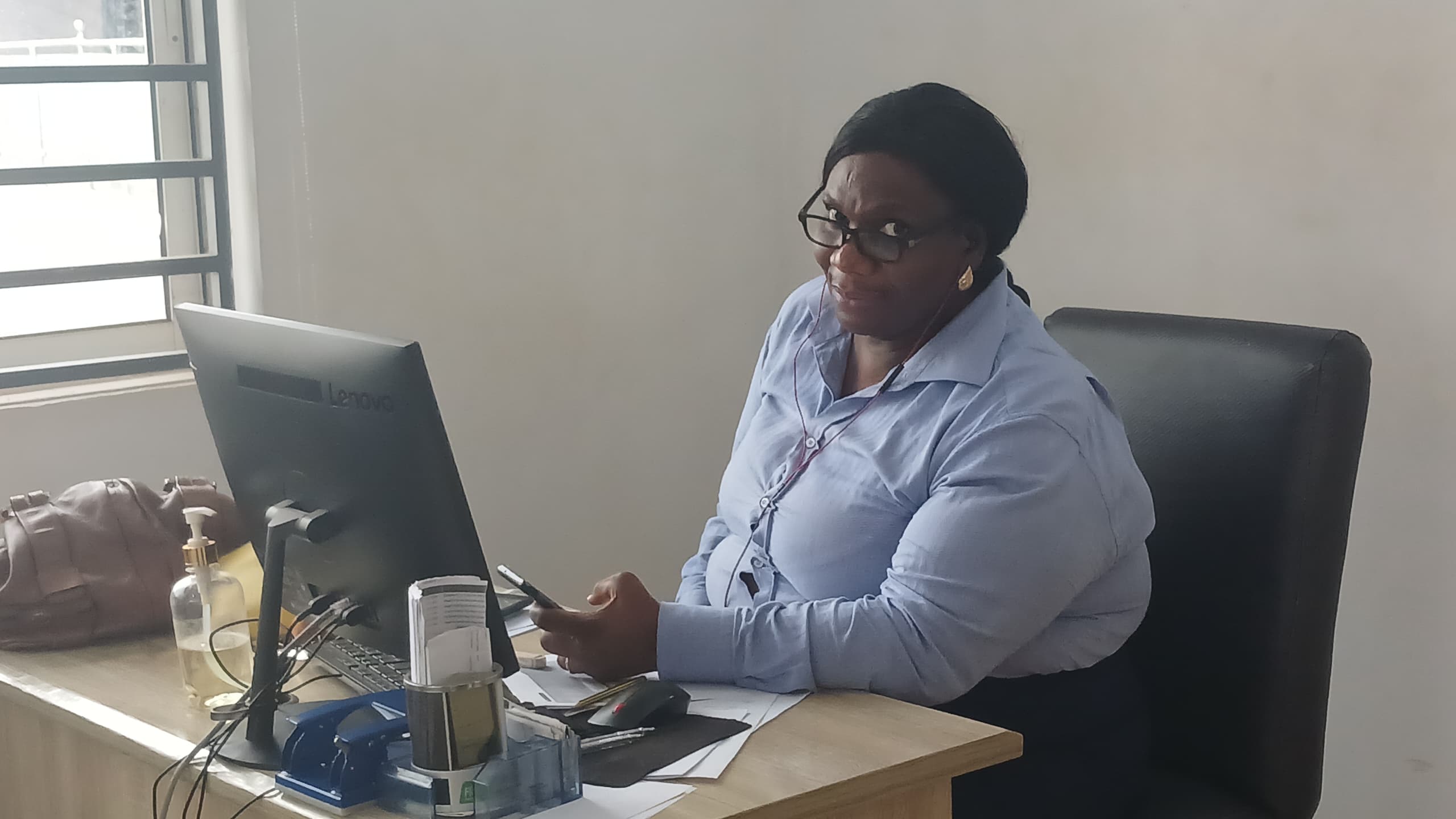 A member of the FIT MFB team at work in the bank’s office